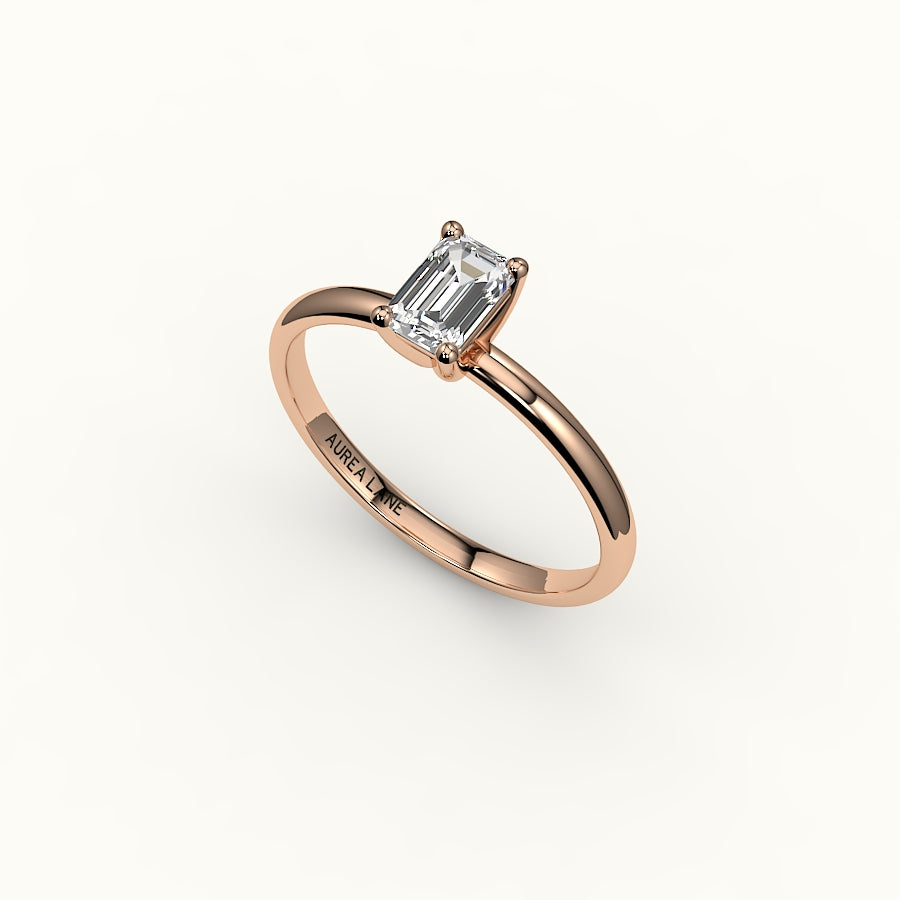 Engaste clásico de anillo solitario de talla esmeralda