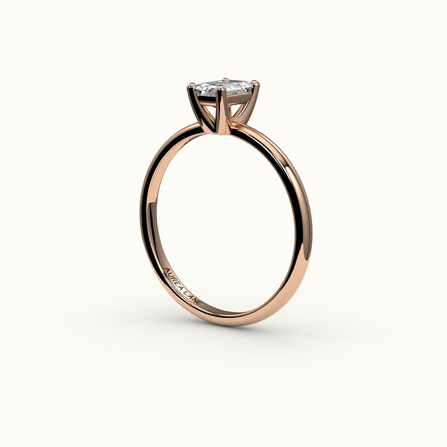 Engaste clásico de anillo solitario de talla esmeralda