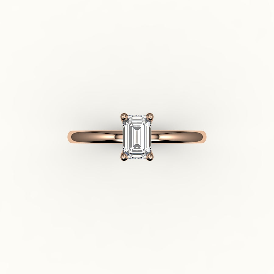 Engaste clásico de anillo solitario de talla esmeralda