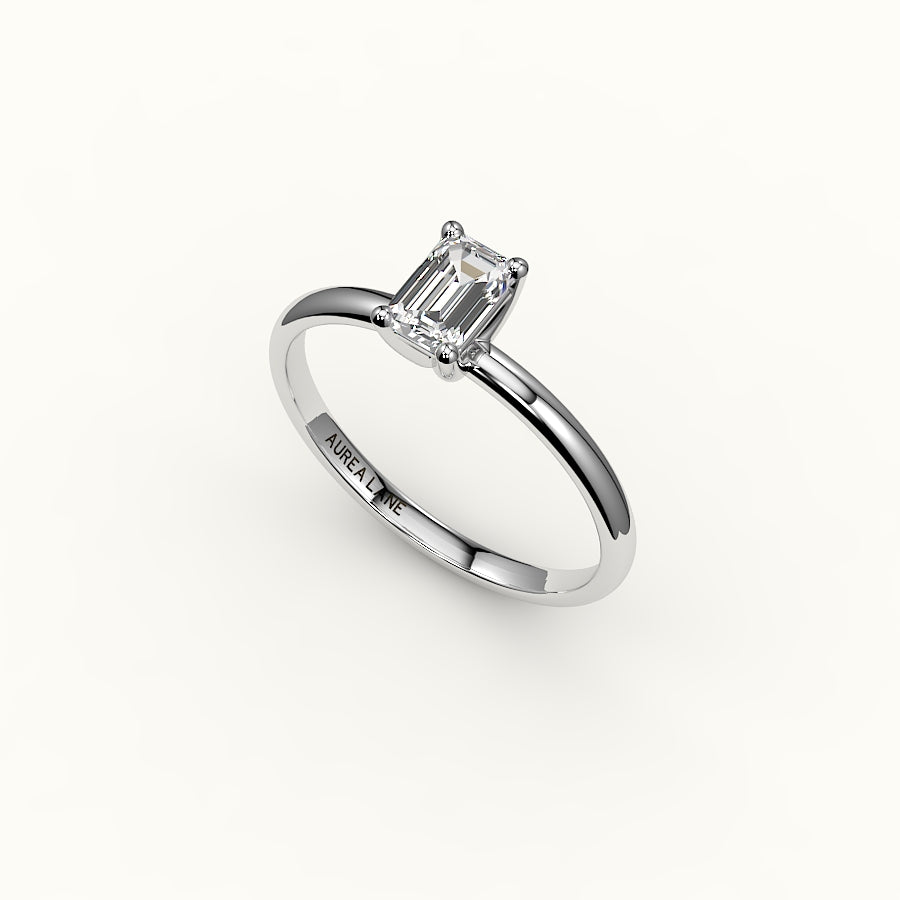 Engaste clásico de anillo solitario de talla esmeralda