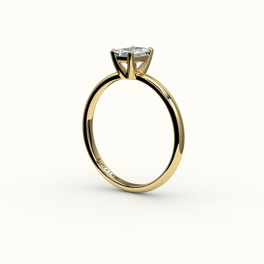 Engaste clásico de anillo solitario de talla esmeralda