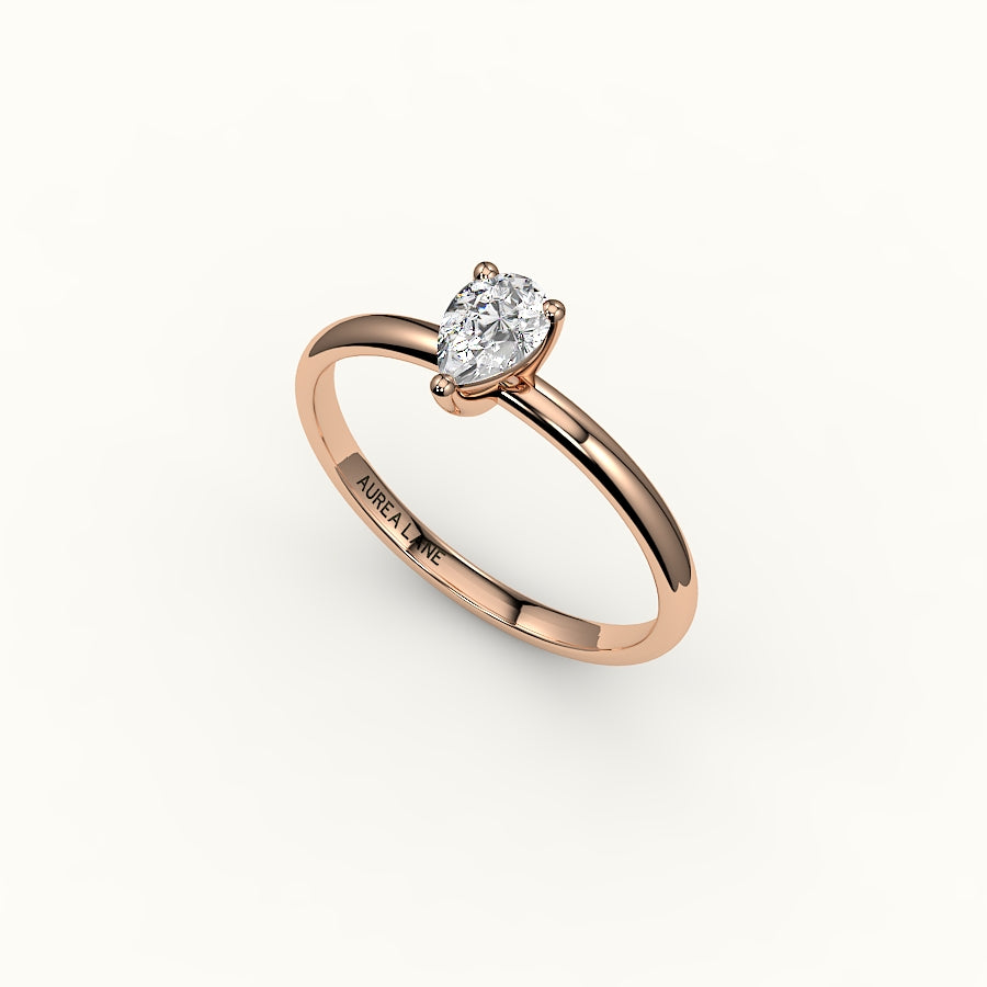 Engaste de anillo solitario clásico de corte de pera