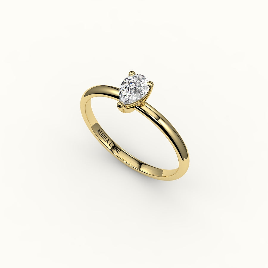 Engaste de anillo solitario clásico de corte de pera
