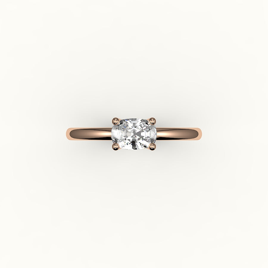 Anillo solitario con engaste de cojín alargado este-oeste