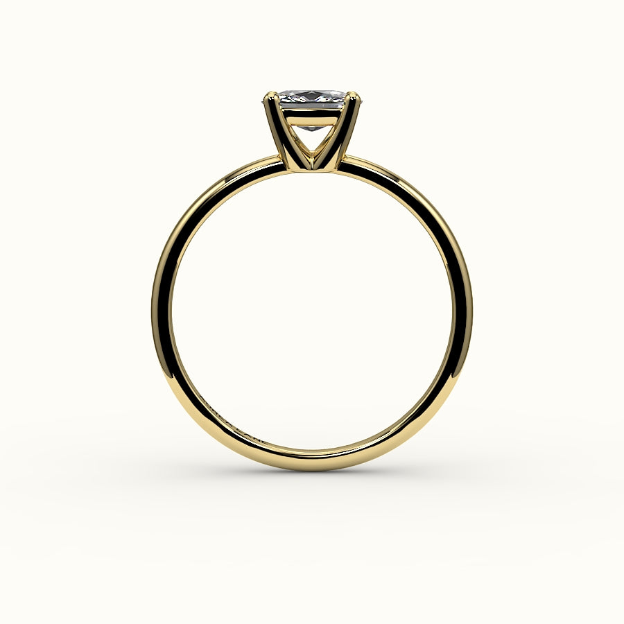 Anillo solitario con engaste de cojín alargado este-oeste