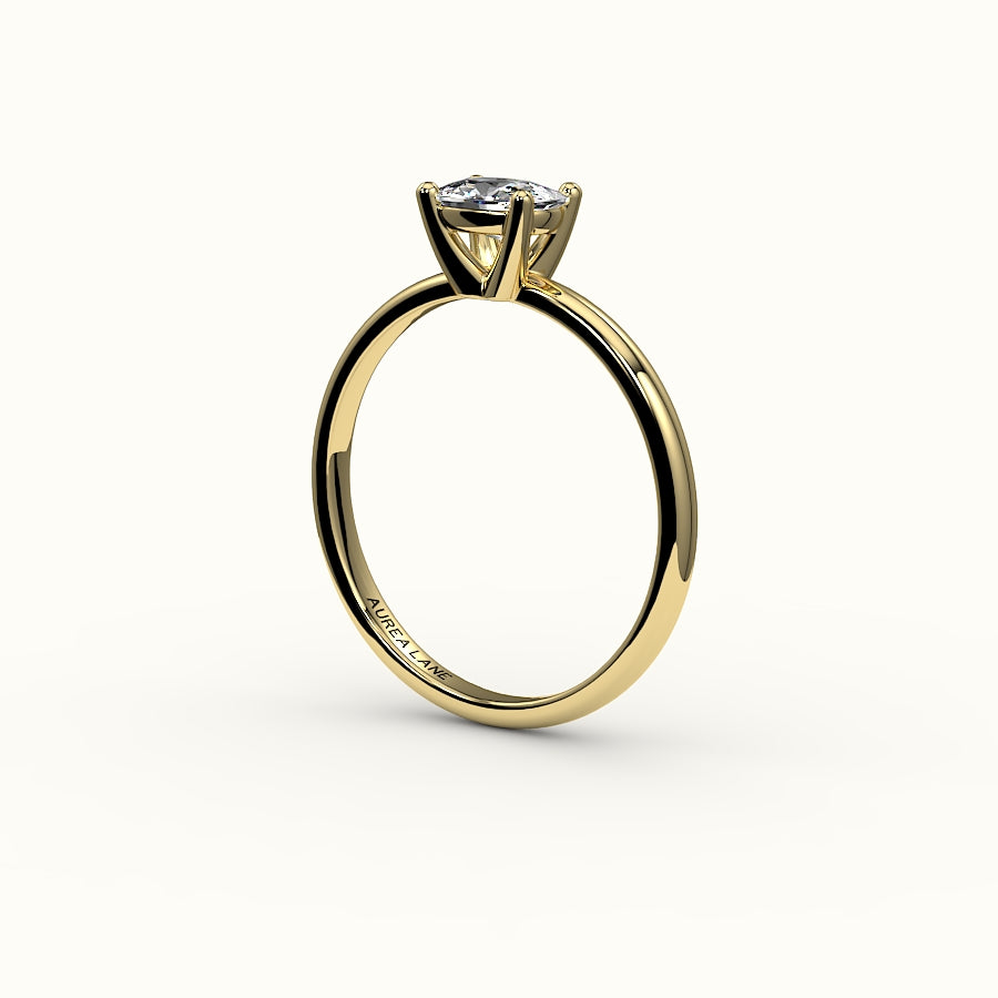 Anillo solitario con engaste de cojín alargado este-oeste