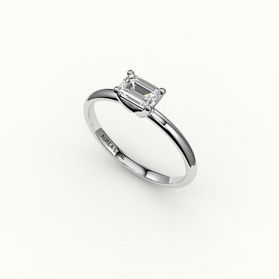 Engaste de anillo solitario de corte esmeralda este-oeste