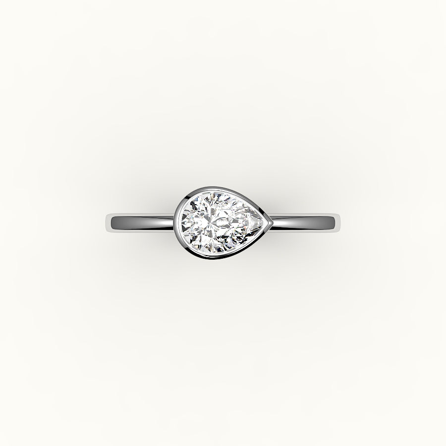 Engaste de anillo con bisel de corte de pera este-oeste