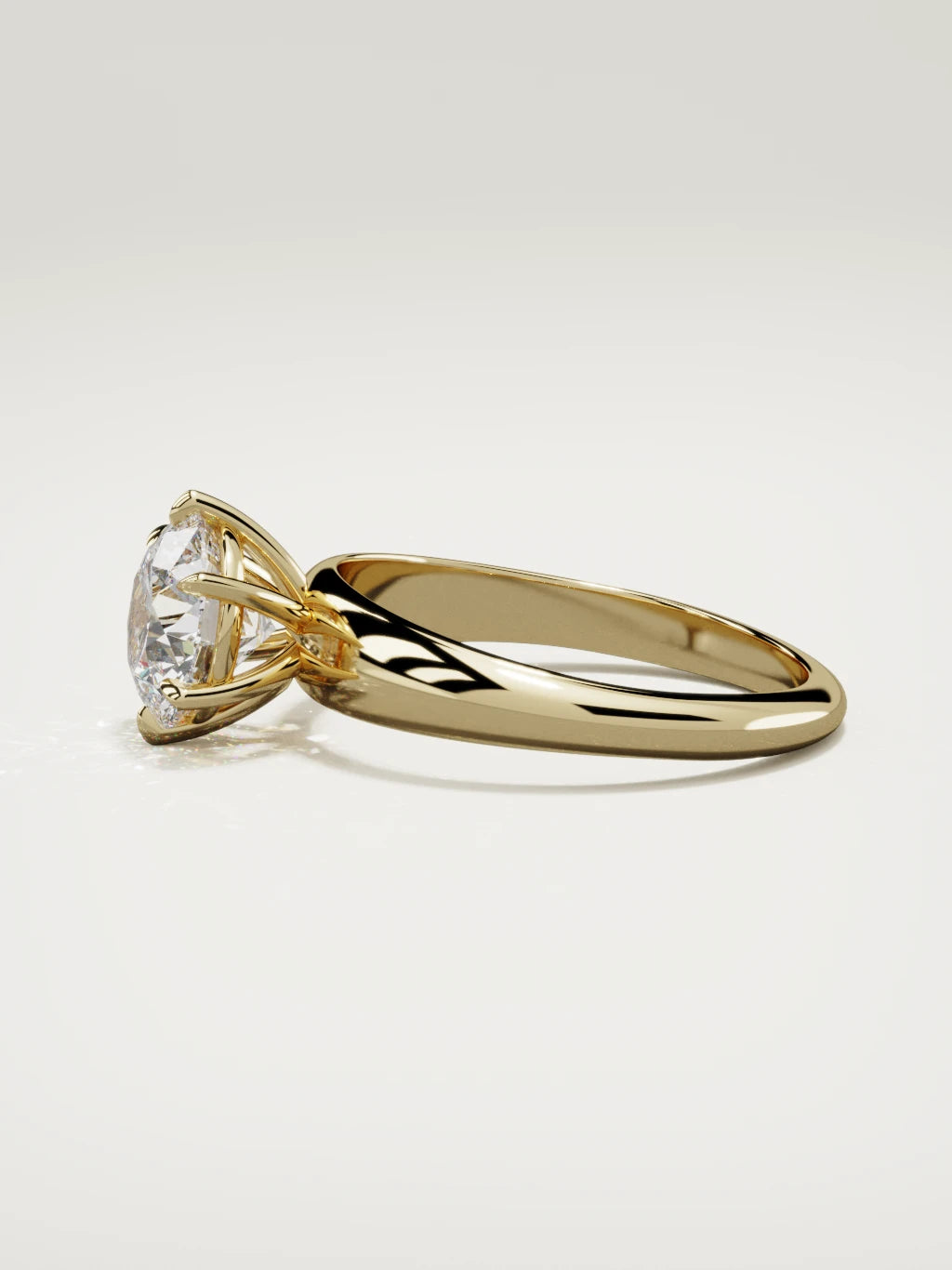 The Aire round lab-grown diamond solitaire in 14K yellow gold, side view