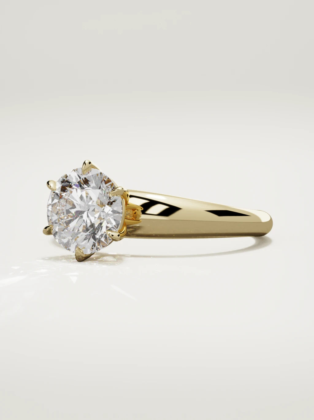 The Aire round lab-grown diamond solitaire in 14K yellow gold, three-quarter view
