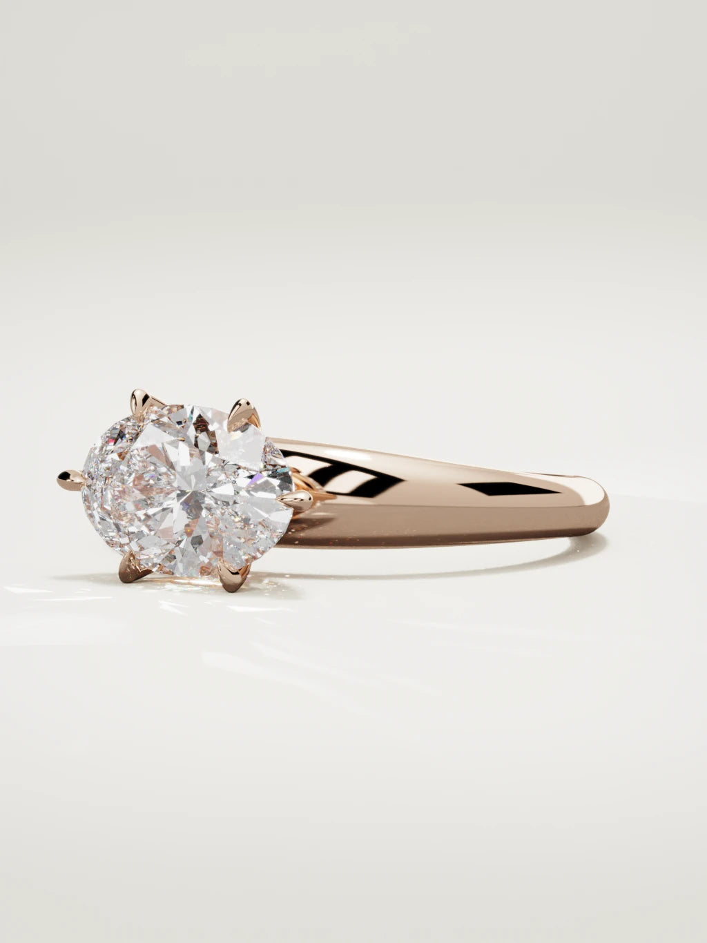 The Aire east-west oval lab-grown diamond solitaire in 14K rose gold, three-quarter view