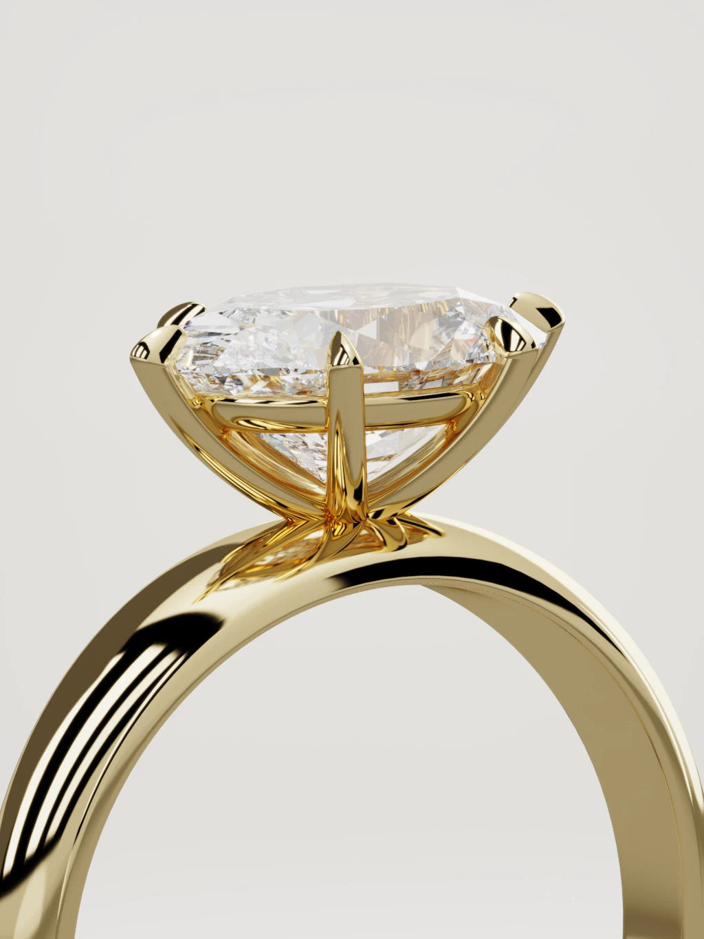 The Aire east-west oval lab-grown diamond solitaire in 14K yellow gold, standing three-quarter view
