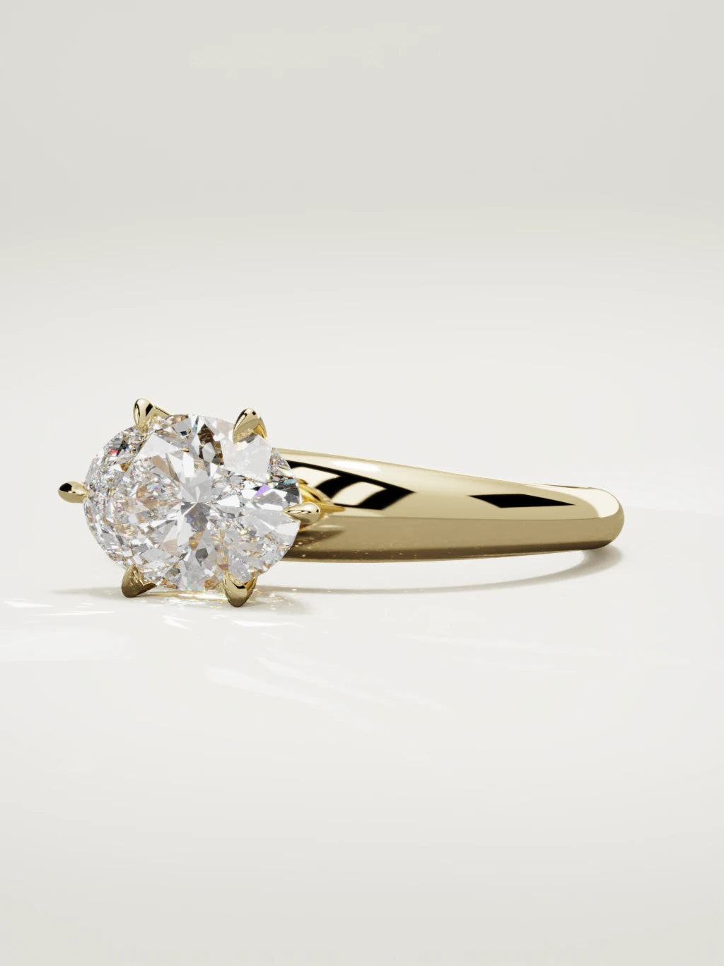 The Aire east-west oval lab-grown diamond solitaire in 14K yellow gold, three-quarter view