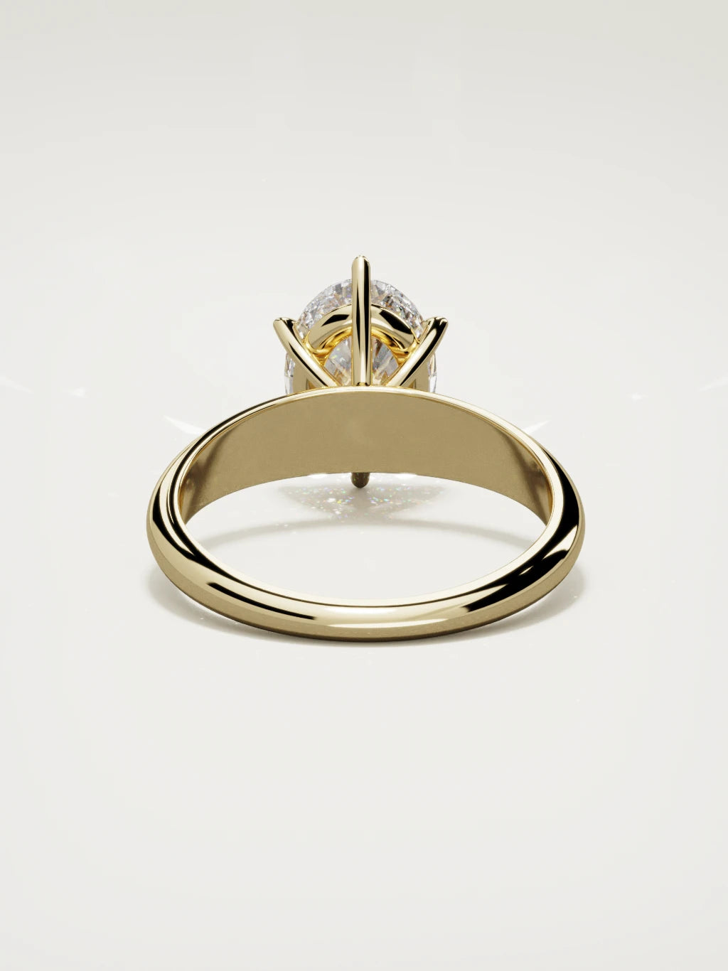 The Aire oval lab-grown diamond solitaire in 14K yellow gold, back view