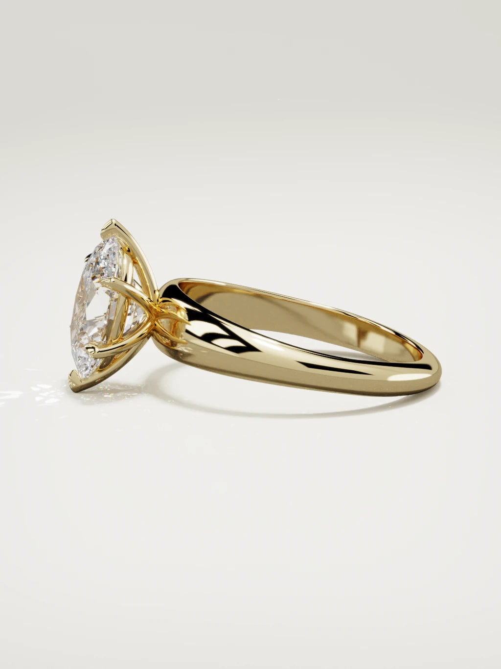 The Aire oval lab-grown diamond solitaire in 14K yellow gold, side view