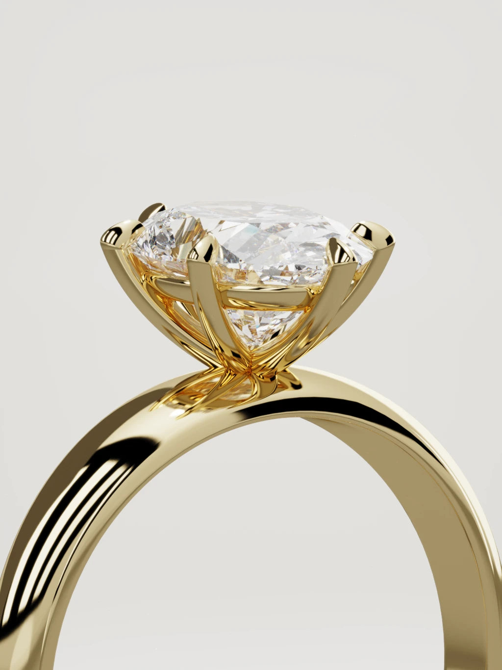 The Aire oval lab-grown diamond solitaire in 14K yellow gold, standing three-quarter view