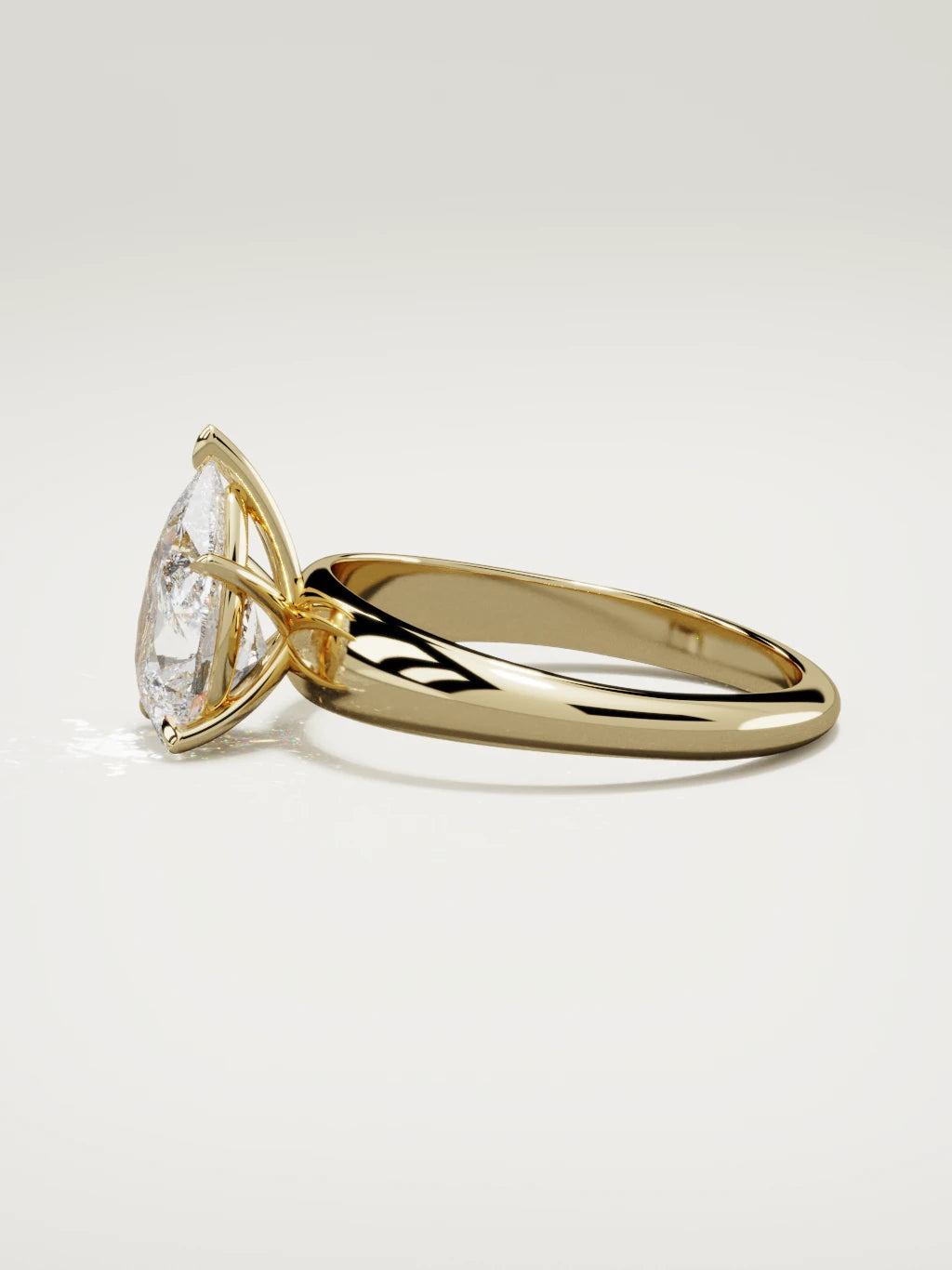 The Aire pear-shaped lab-grown diamond solitaire in 14K yellow gold, side view