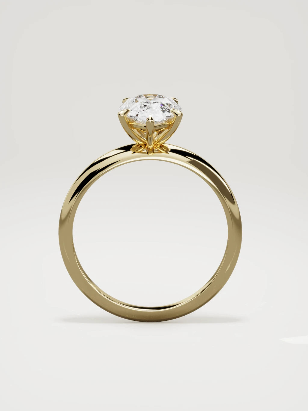 The Aire pear-shaped lab-grown diamond solitaire in 14K yellow gold, standing front view