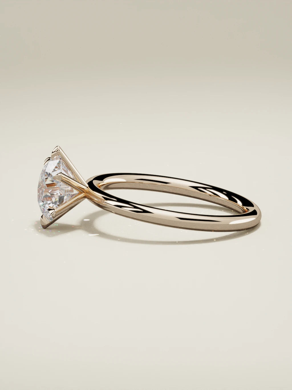 The Alba round lab-grown diamond solitaire in 14K rose gold, side view