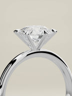 The Alba round lab-grown diamond solitaire in 14K white gold, standing three-quarter view