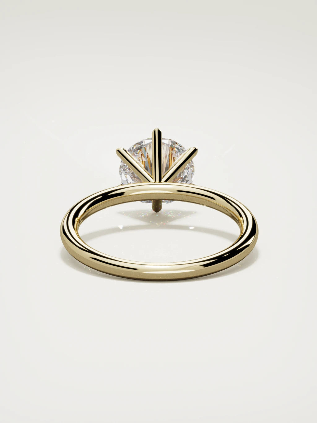The Alba round lab-grown diamond solitaire in 14K yellow gold, back view