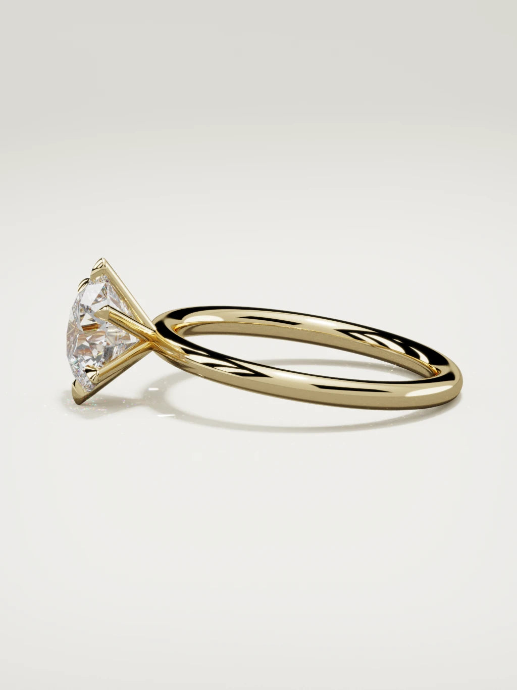 The Alba round lab-grown diamond solitaire in 14K yellow gold, side view