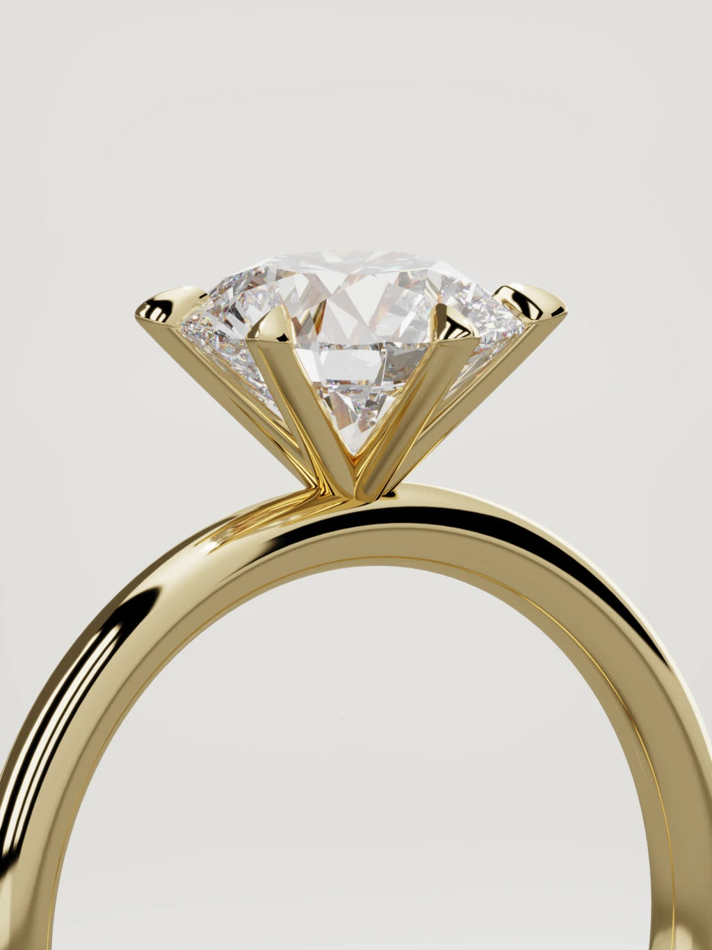 The Alba round lab-grown diamond solitaire in 14K yellow gold, standing three-quarter view