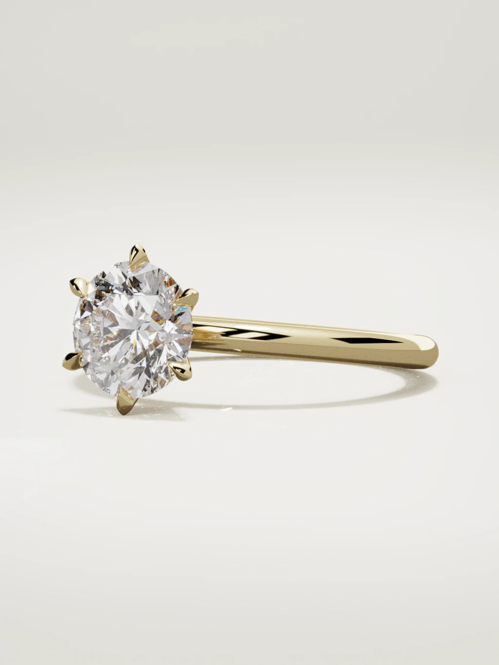 The Alba round lab-grown diamond solitaire in 14K yellow gold, three-quarter view