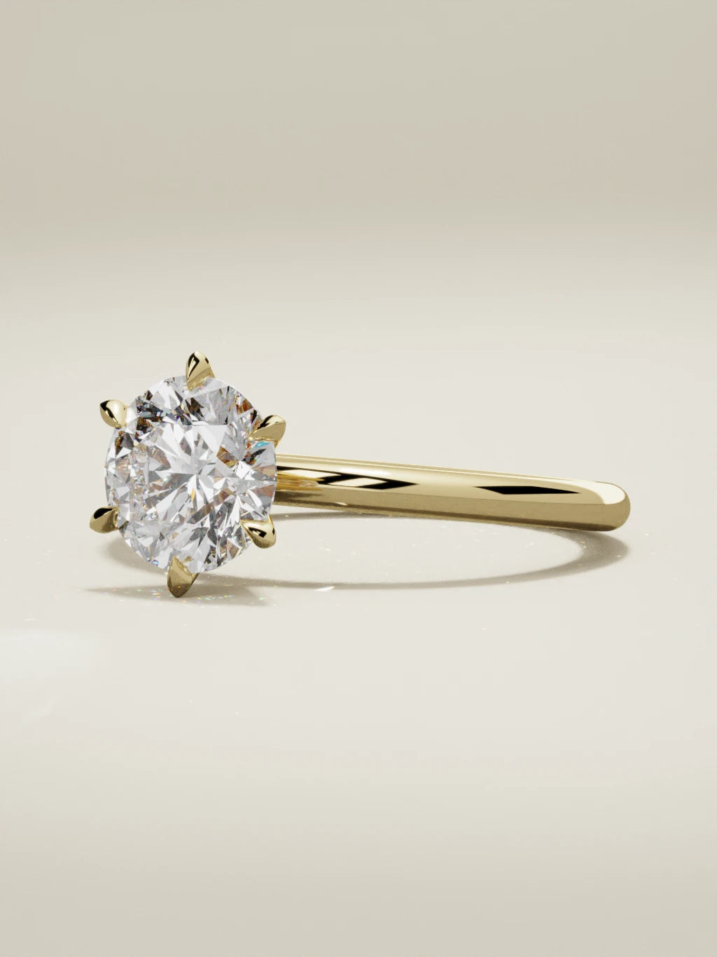 The Alba round lab-grown diamond solitaire in 14K yellow gold, three-quarter view