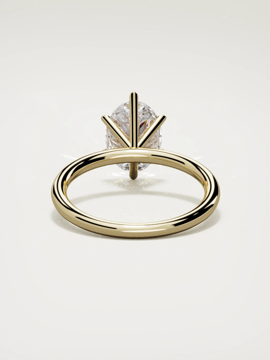 The Alba oval lab-grown diamond solitaire in 14K yellow gold, back view