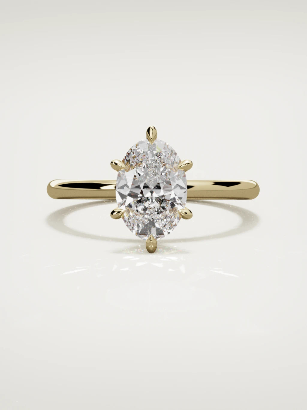 The Alba oval lab-grown diamond solitaire in 14K yellow gold, front view