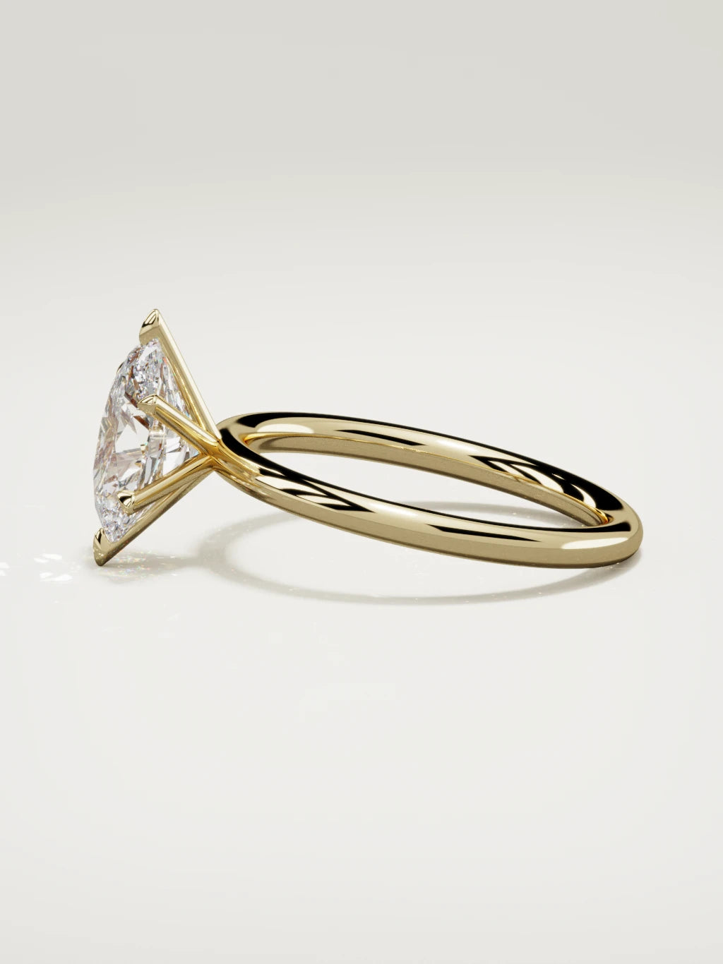 The Alba oval lab-grown diamond solitaire in 14K yellow gold, side view
