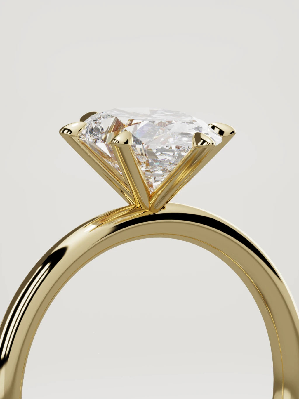 The Alba oval lab-grown diamond solitaire in 14K yellow gold, standing three-quarter view