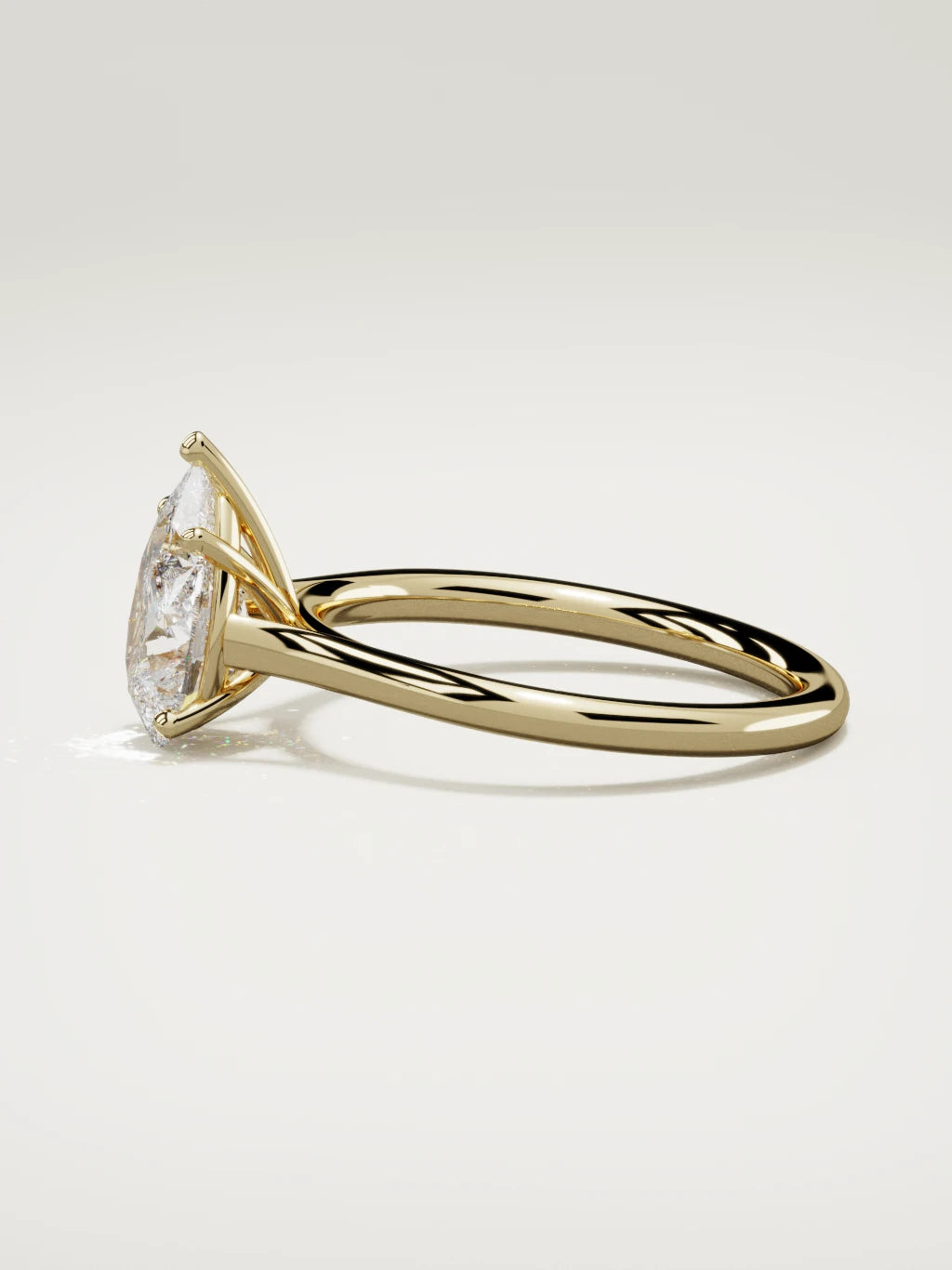 The Altar pear-shaped lab-grown diamond solitaire in 14K yellow gold, side view