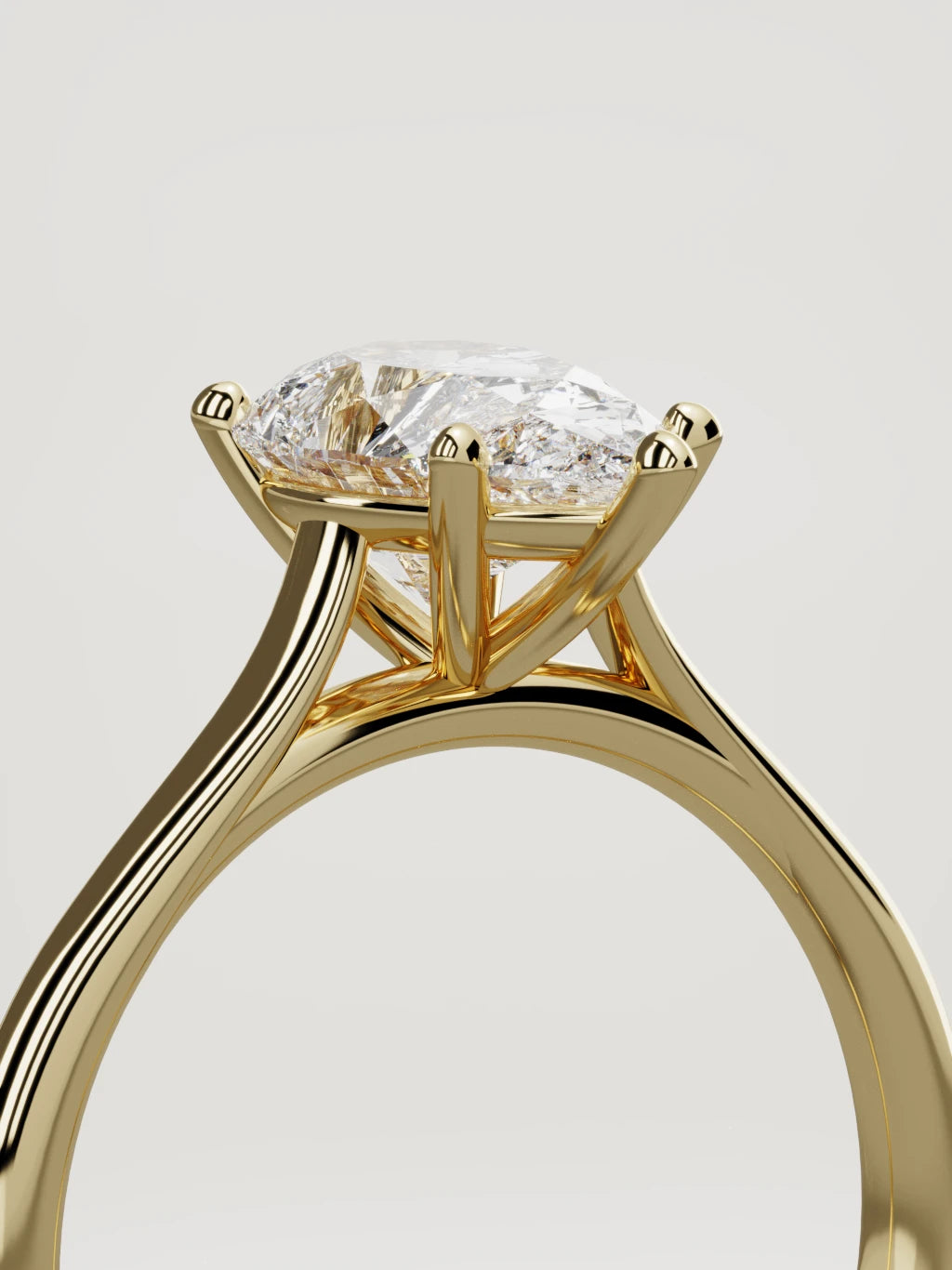 The Altar pear-shaped lab-grown diamond solitaire in 14K yellow gold, standing three-quarter view