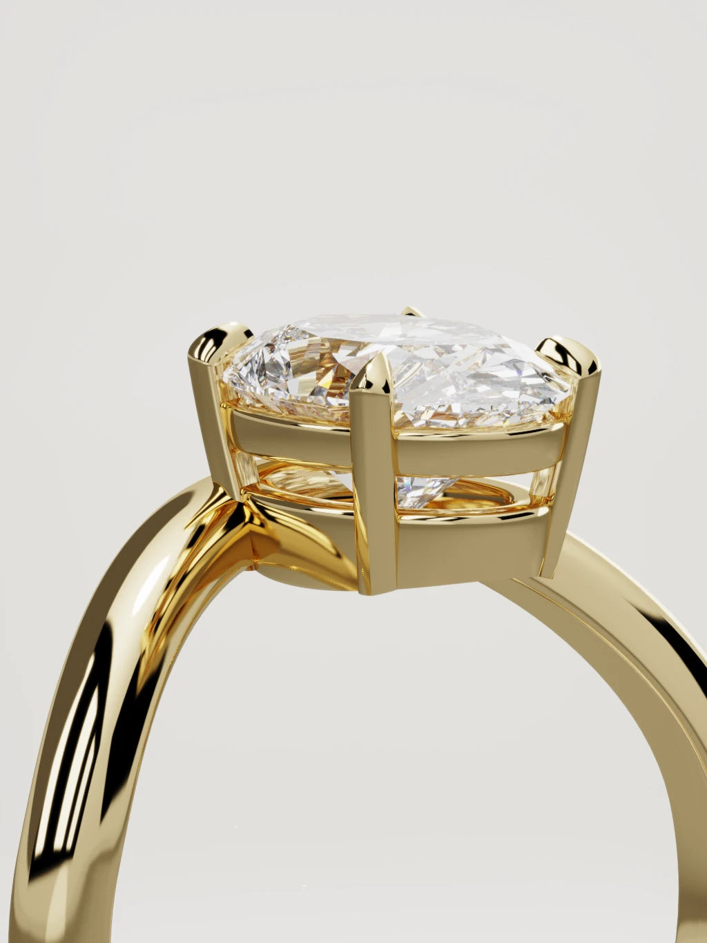 The Arco oval lab-grown diamond solitaire in 14K yellow gold, standing three-quarter view