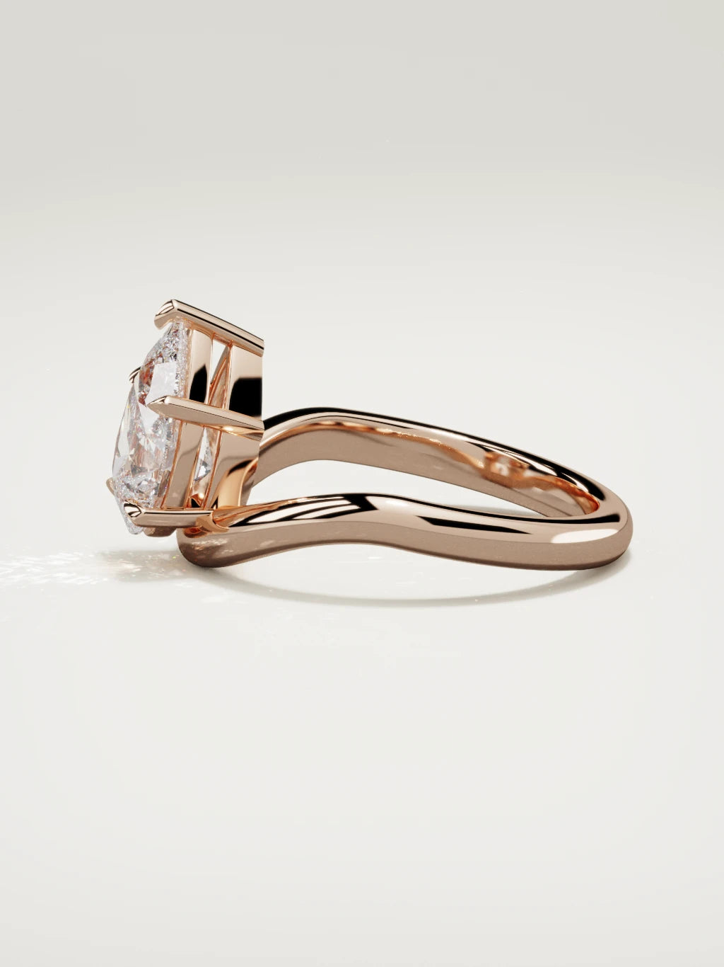 The Arco pear-shaped lab-grown diamond solitaire in 14K rose gold, side view