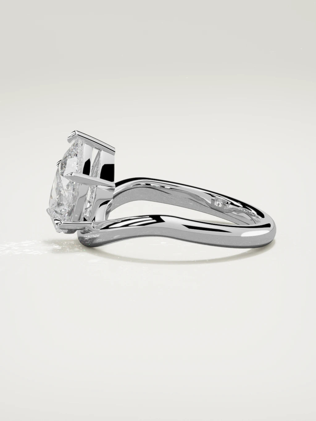 The Arco pear-shaped lab-grown diamond solitaire in 14K white gold, side view
