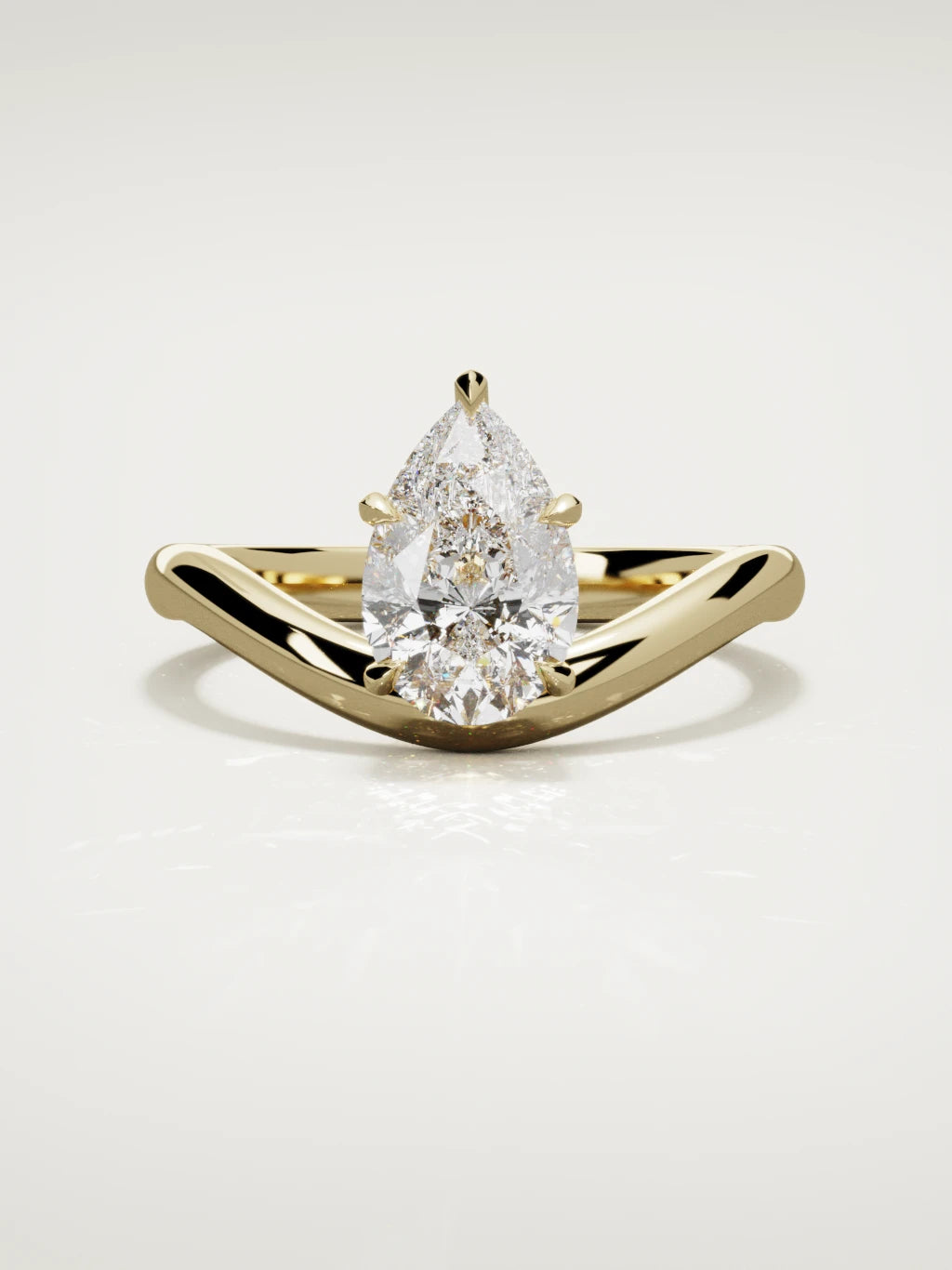 The Arco pear-shaped lab-grown diamond solitaire in 14K yellow gold, front view