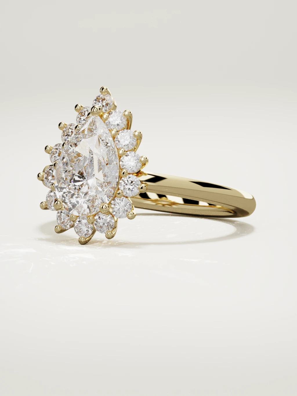 The Aura pear-shaped lab-grown diamond solitaire in 14K yellow gold, three-quarter view
