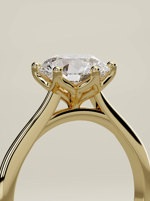 The Azahar round lab-grown diamond solitaire in 14K yellow gold, standing three-quarter view