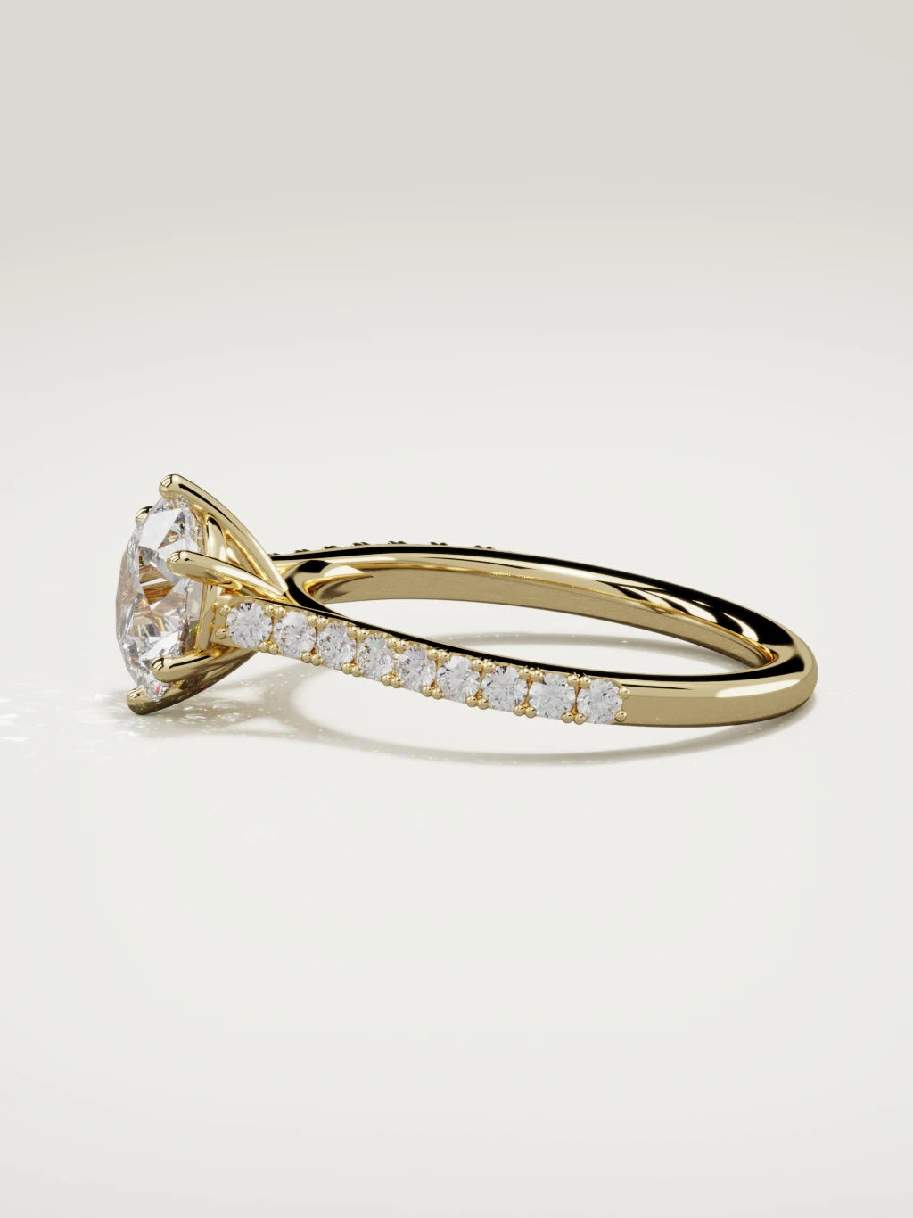 The Blonda round lab-grown diamond solitaire in 14K yellow gold, side view