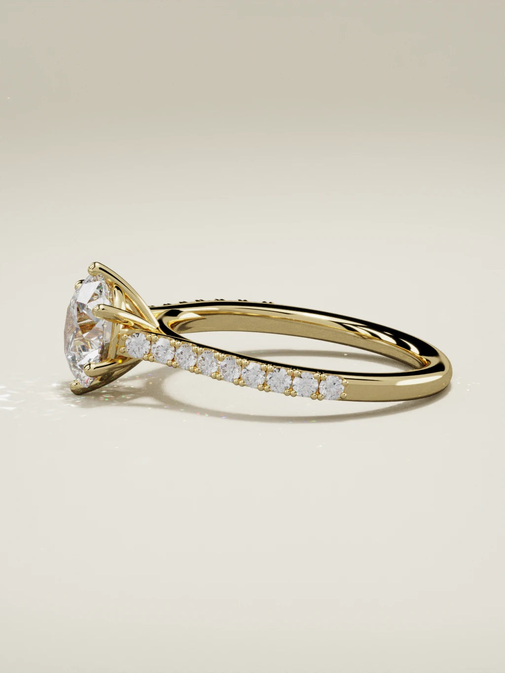 The Blonda round lab-grown diamond solitaire in 14K yellow gold, side view