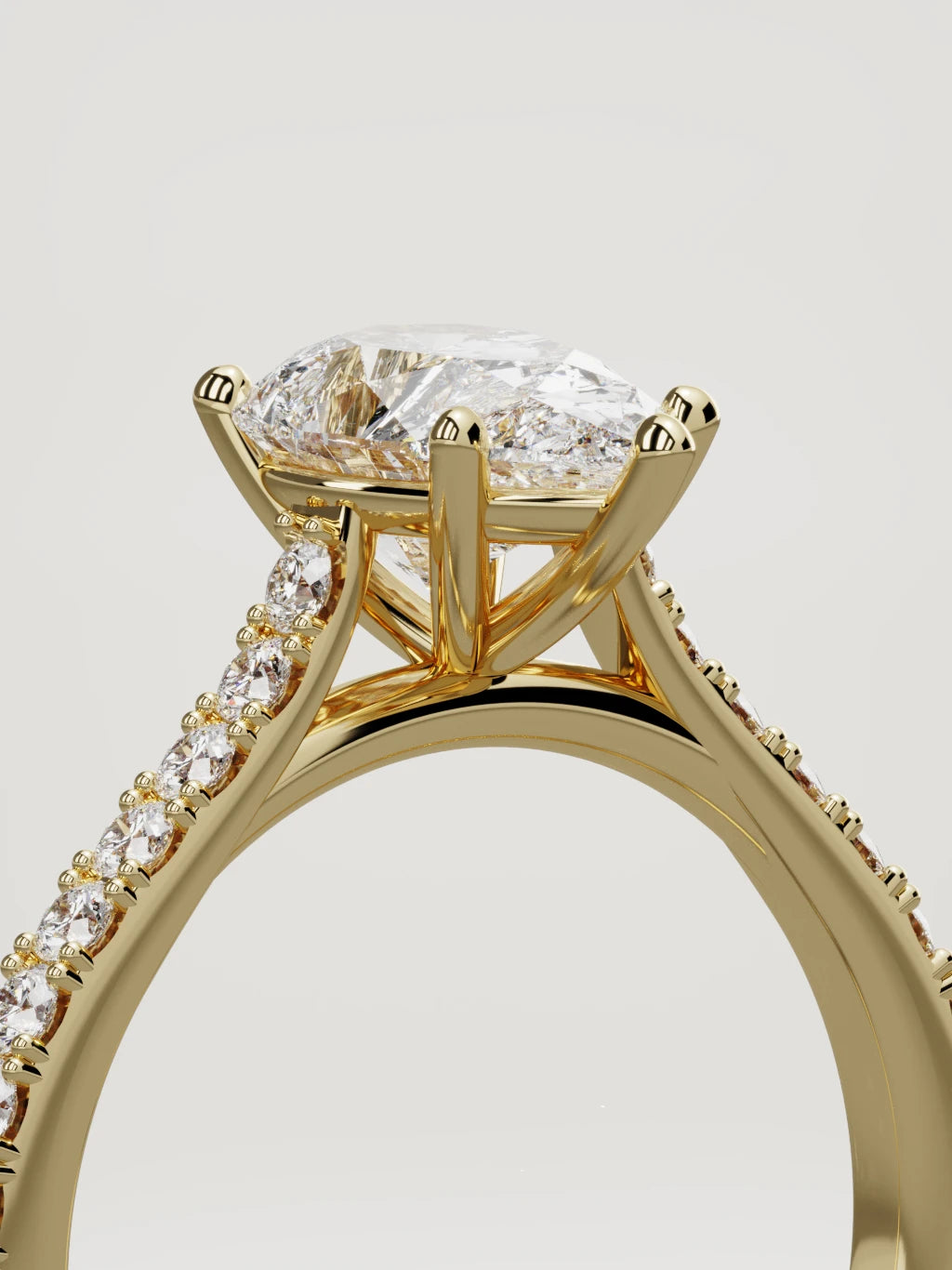 The Blonda pear-shaped lab-grown diamond solitaire in 14K yellow gold, standing three-quarter view