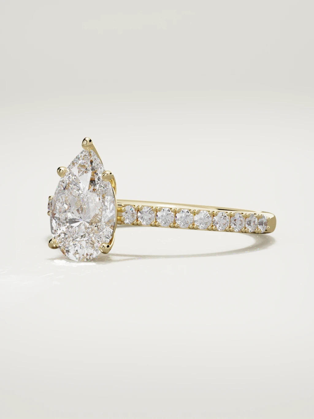 The Blonda pear-shaped lab-grown diamond solitaire in 14K yellow gold, three-quarter view