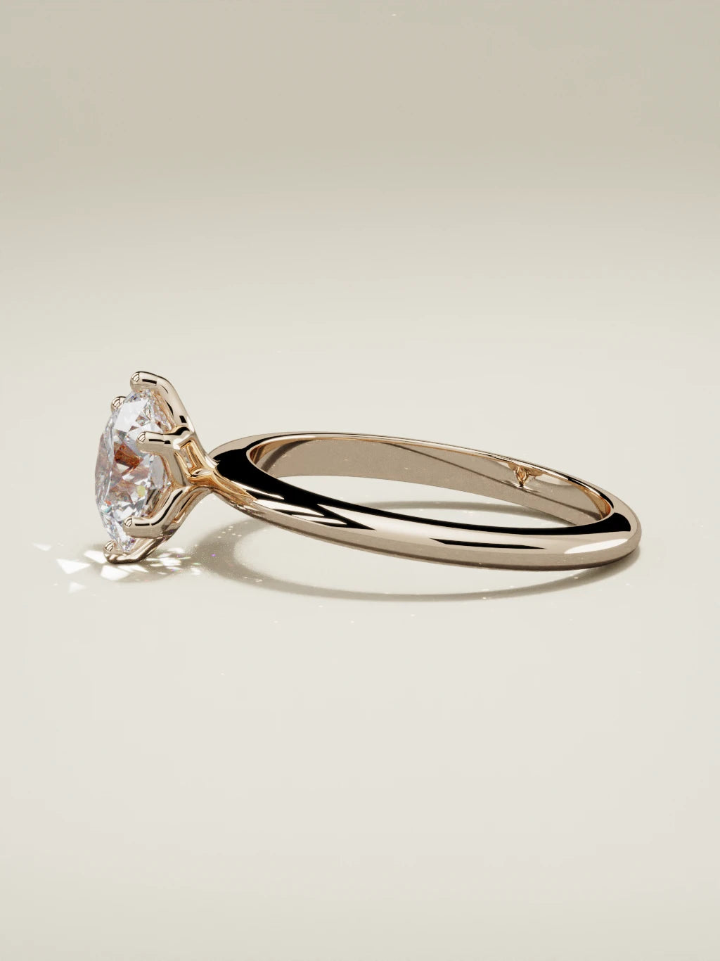 The Dalia round lab-grown diamond solitaire in 14K rose gold, side view