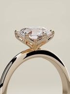 The Dalia round lab-grown diamond solitaire in 14K rose gold, standing three-quarter view