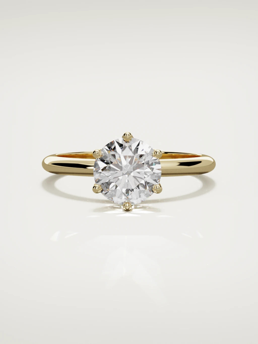 The Dalia round lab-grown diamond solitaire in 14K yellow gold, front view