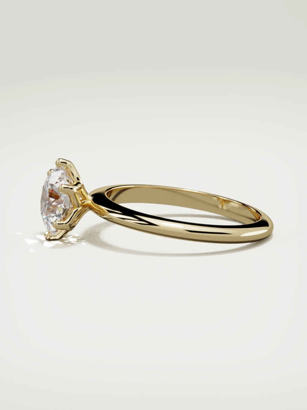 The Dalia round lab-grown diamond solitaire in 14K yellow gold, side view