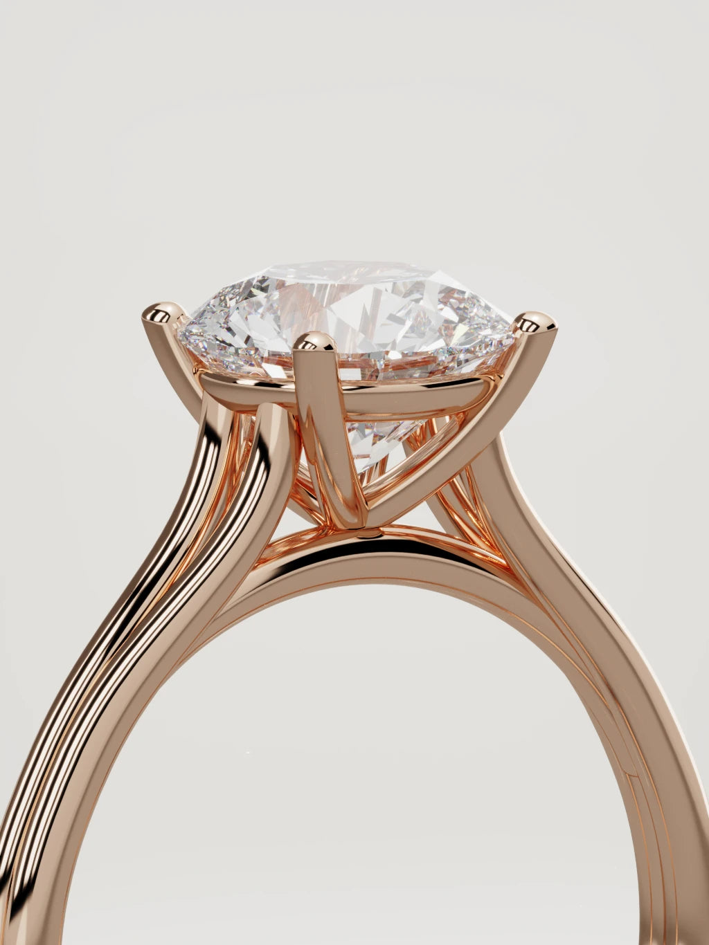 The Duo round lab-grown diamond solitaire in 14K rose gold, standing three-quarter view